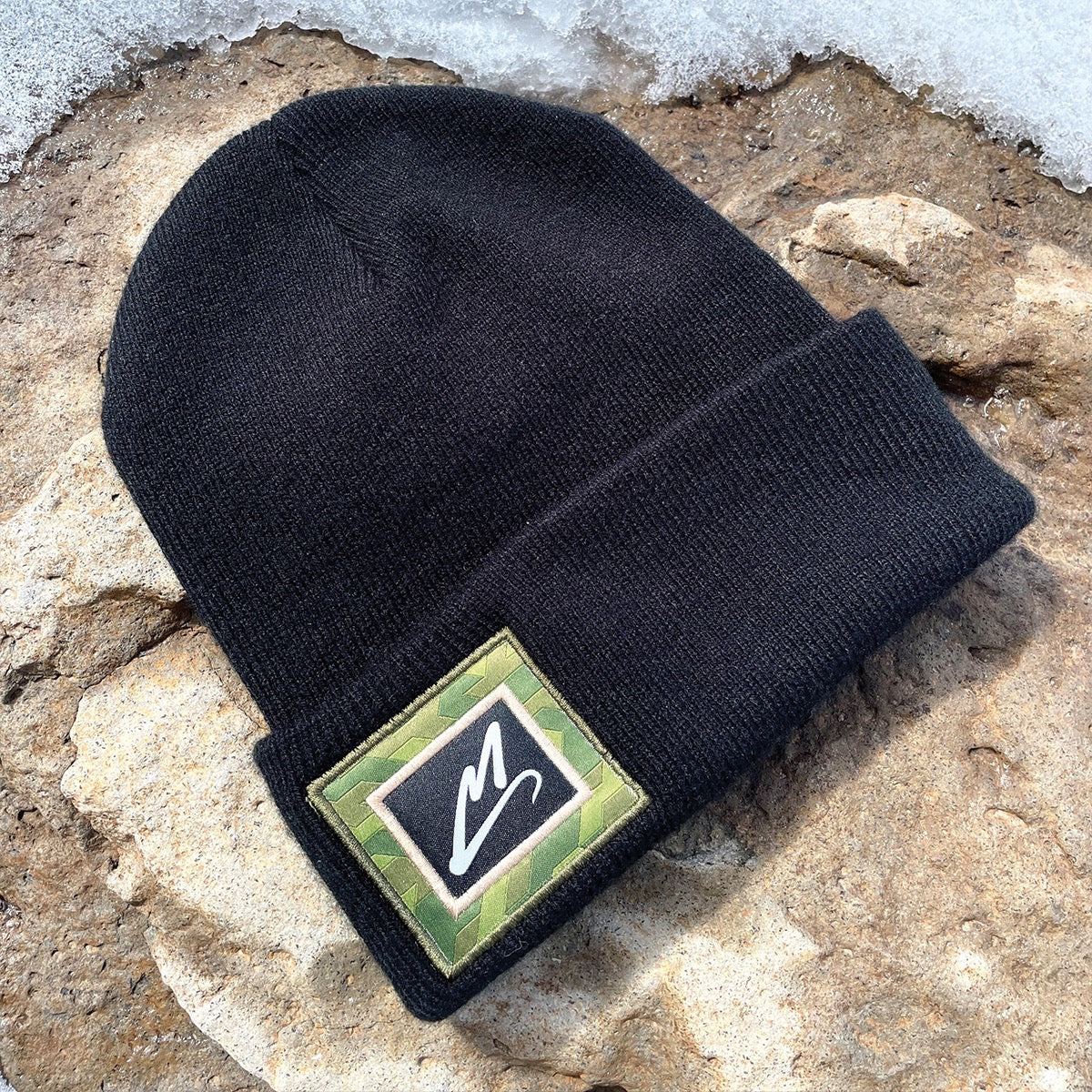 MAVRK Beanie on rock