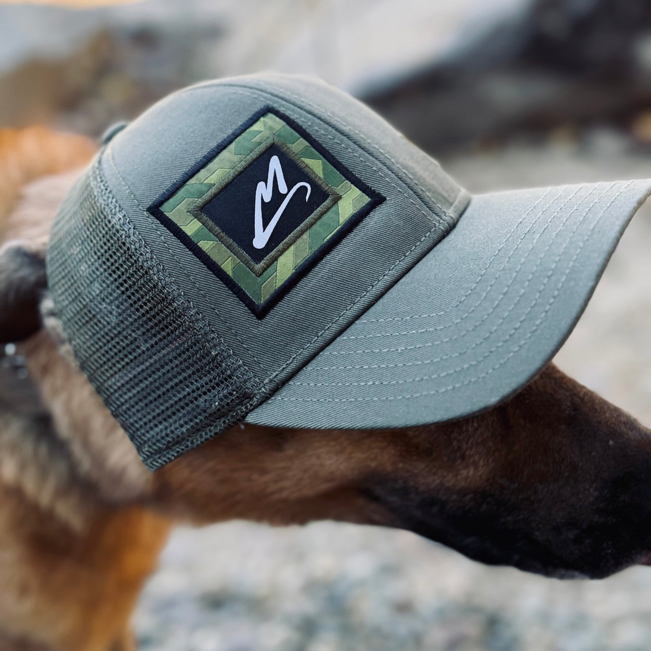 MAVRK olive trucker hat